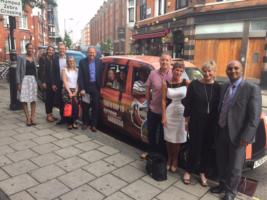 The Antigua and Barbuda Tourism Authority's UK Team and Hotel Partners view the Antigua and Barbuda Branded London Taxis